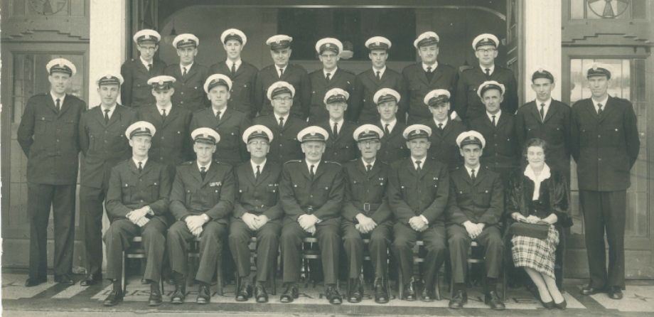 A black and white photo of Wellington Free Ambulance staff